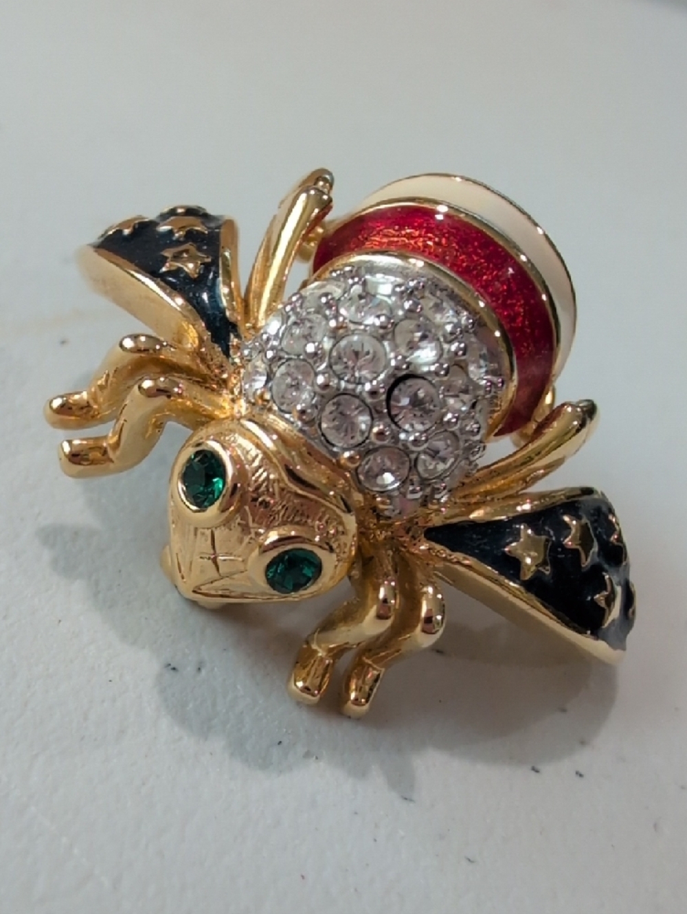 JOAN RIVERS GOLDTONE RHINESTONE AMERICAN FLAG PATRIOTIC BEE  BROOCH